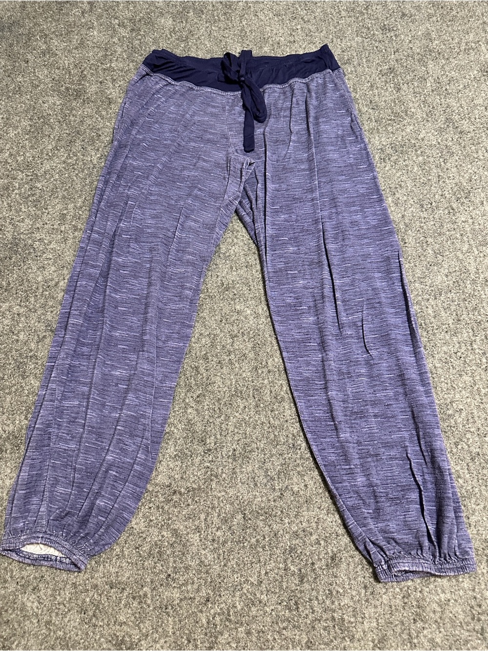 These appear to be blue heathered lounge pants with a dark navy drawstring